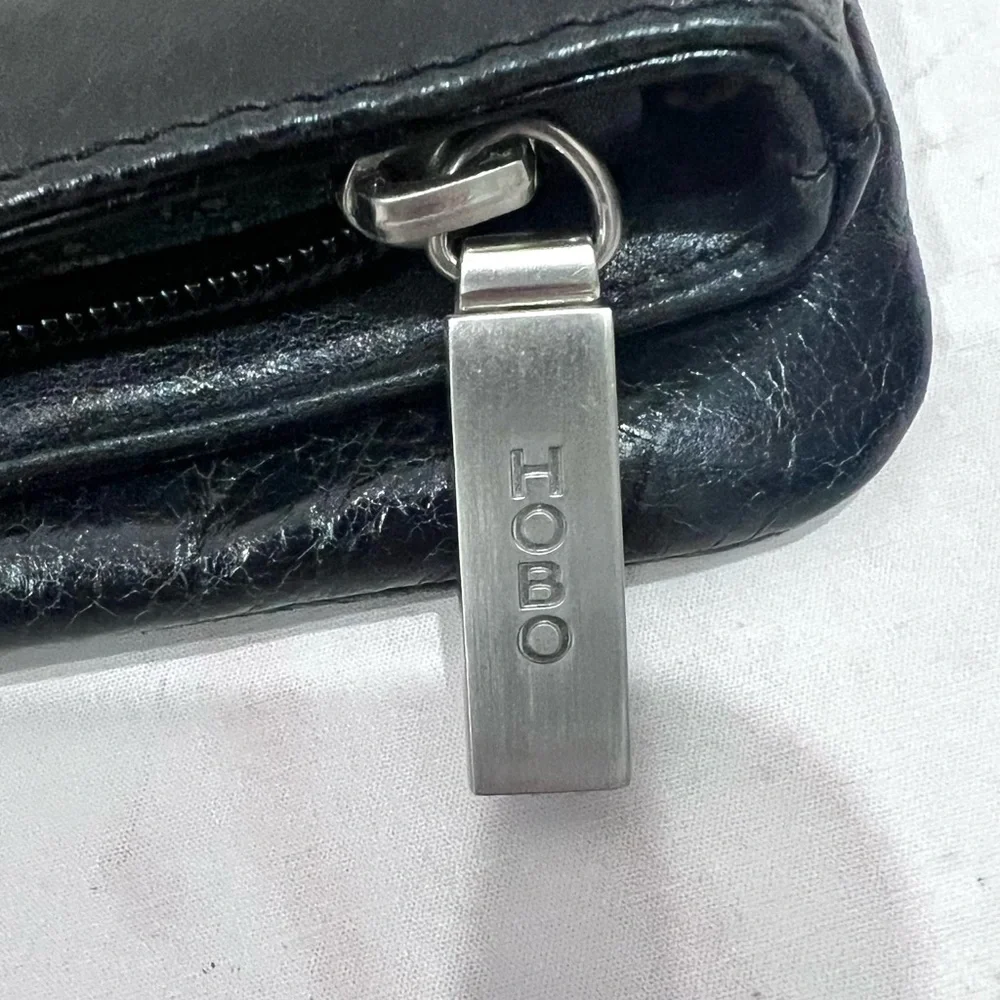 Hobo International Leather Foldover Metal Ring Madeline Clutch Purse